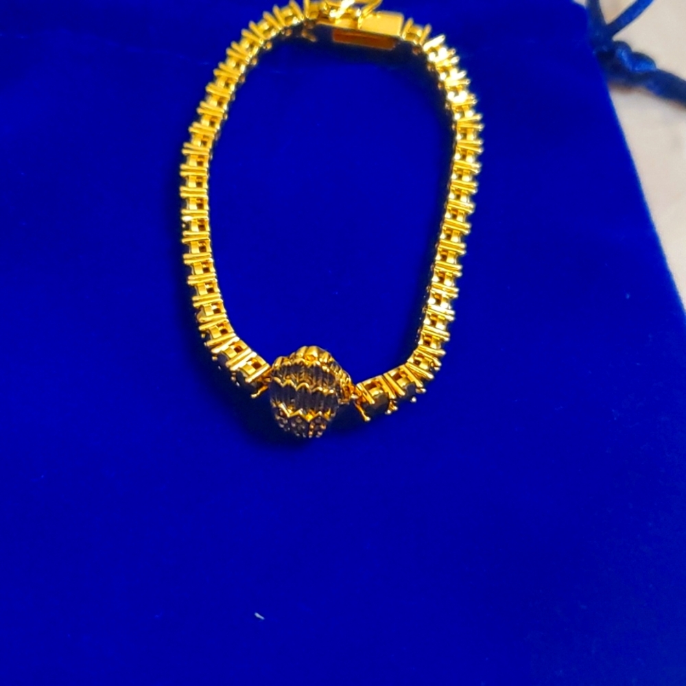 Beautiful Kurt Geiger Eagle gold and stones bracelet.